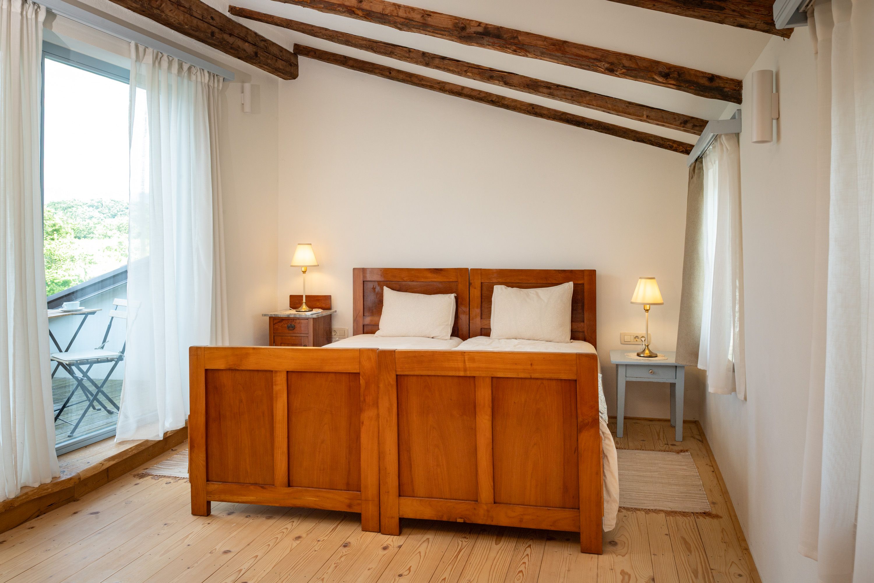 Bright bedroom with terrace access